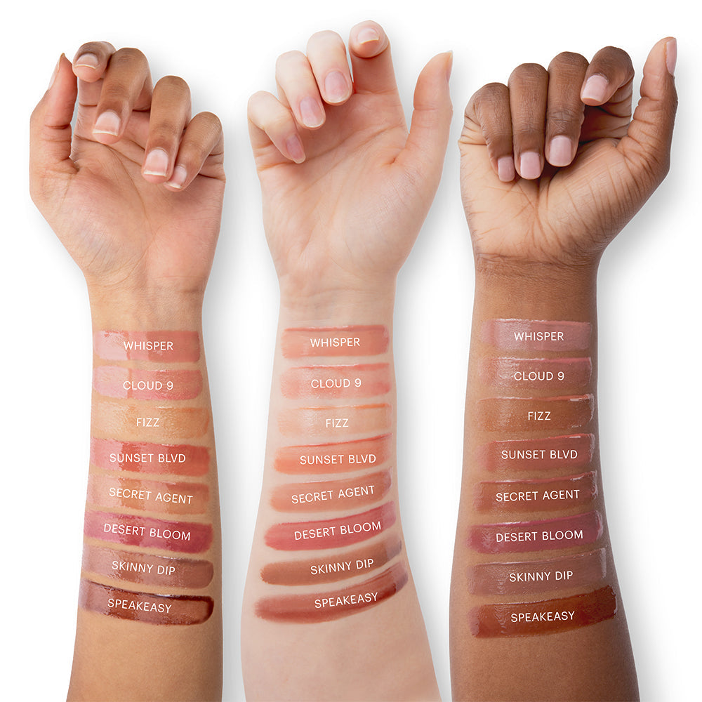 Three arms with swatches labeled WHISPER, CLOUD 9, FIZZ, SUNSET BLVD, SECRET AGENT, DESERT BLOOM, SKINNY DIP, SPEAKEASY