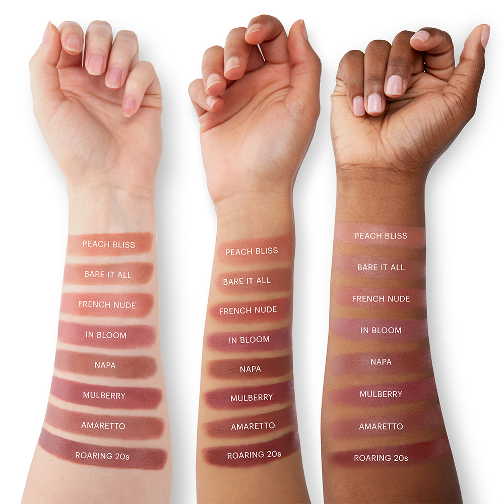 Three arms with swatches labeled PEACH BLISS, BARE IT ALL, FRENCH NUDE, IN BLOOM, NAPA, MULBERRY, AMARETTO, ROARING 20s