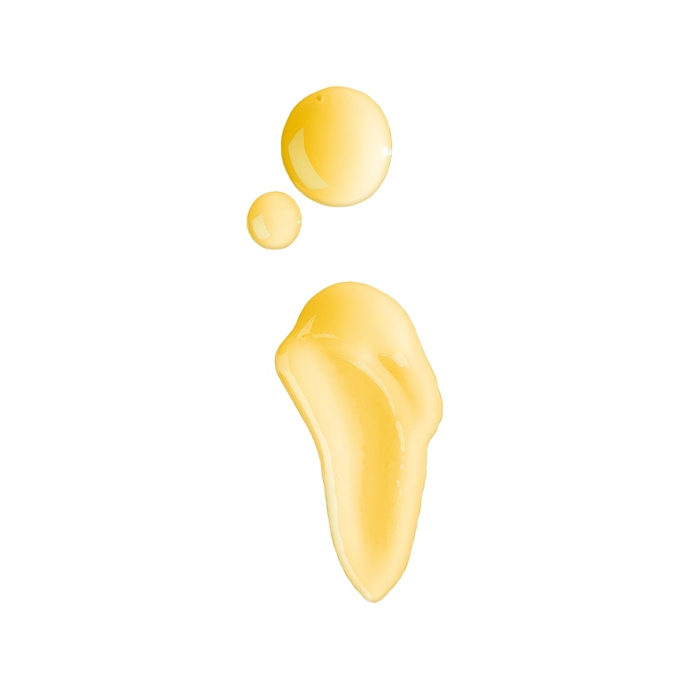 Glossy golden-yellow serum droplets: two small round drops above a larger teardrop smear on white background.