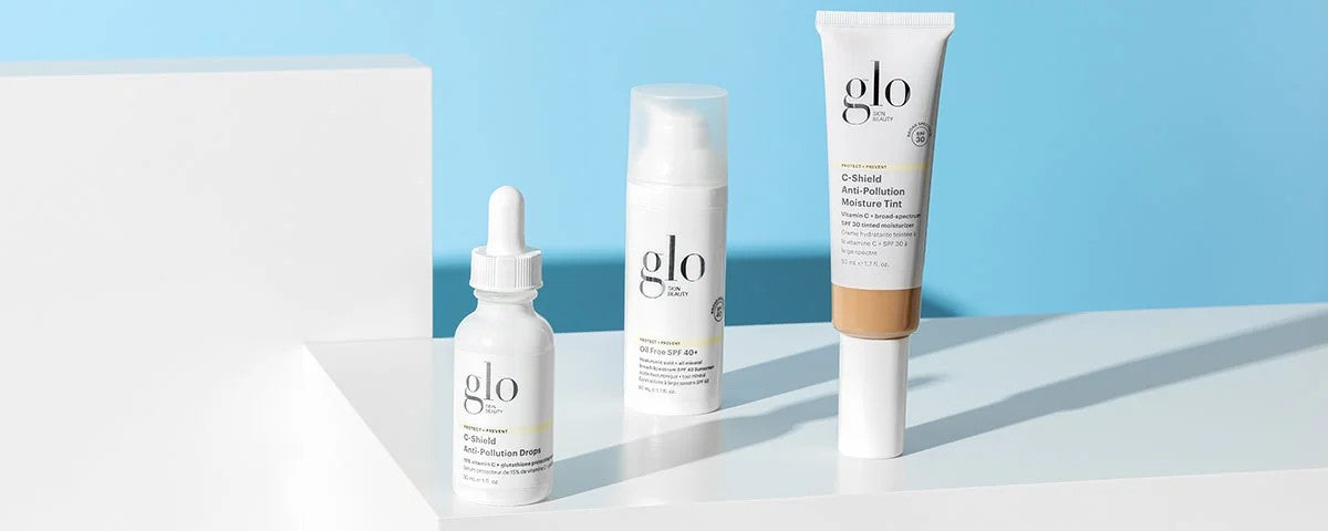 Three glo skin beauty products: C-Shield Anti-Pollution Drops; Oil Free SPF 40+; C-Shield Anti-Pollution Moisture Tint SPF 30