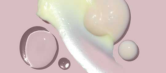 Skincare swatches on a purple background