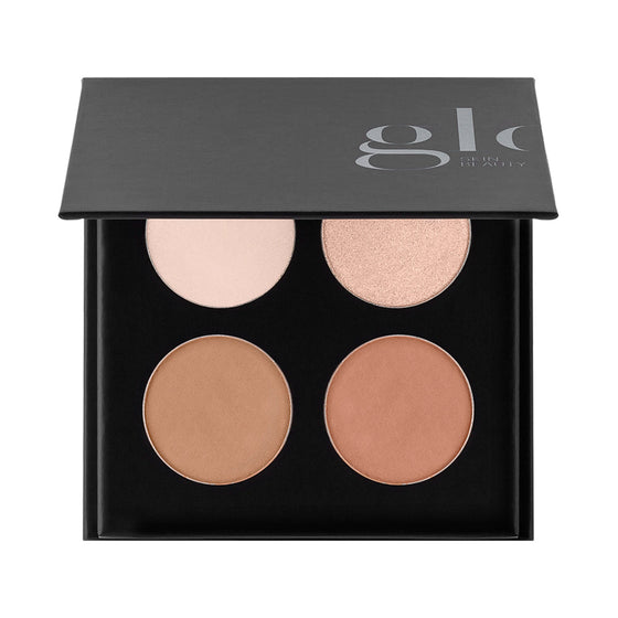 Black compact labeled glo SKIN BEAUTY holding four pans: two light highlight shades and two warm contour browns.