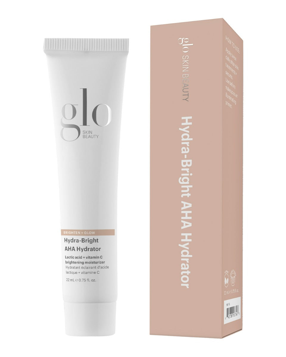 Front view of Hydra-Bright AHA Hydrator tube and matching box showing lactic acid and vitamin C brightening moisturizer label, 22 mL