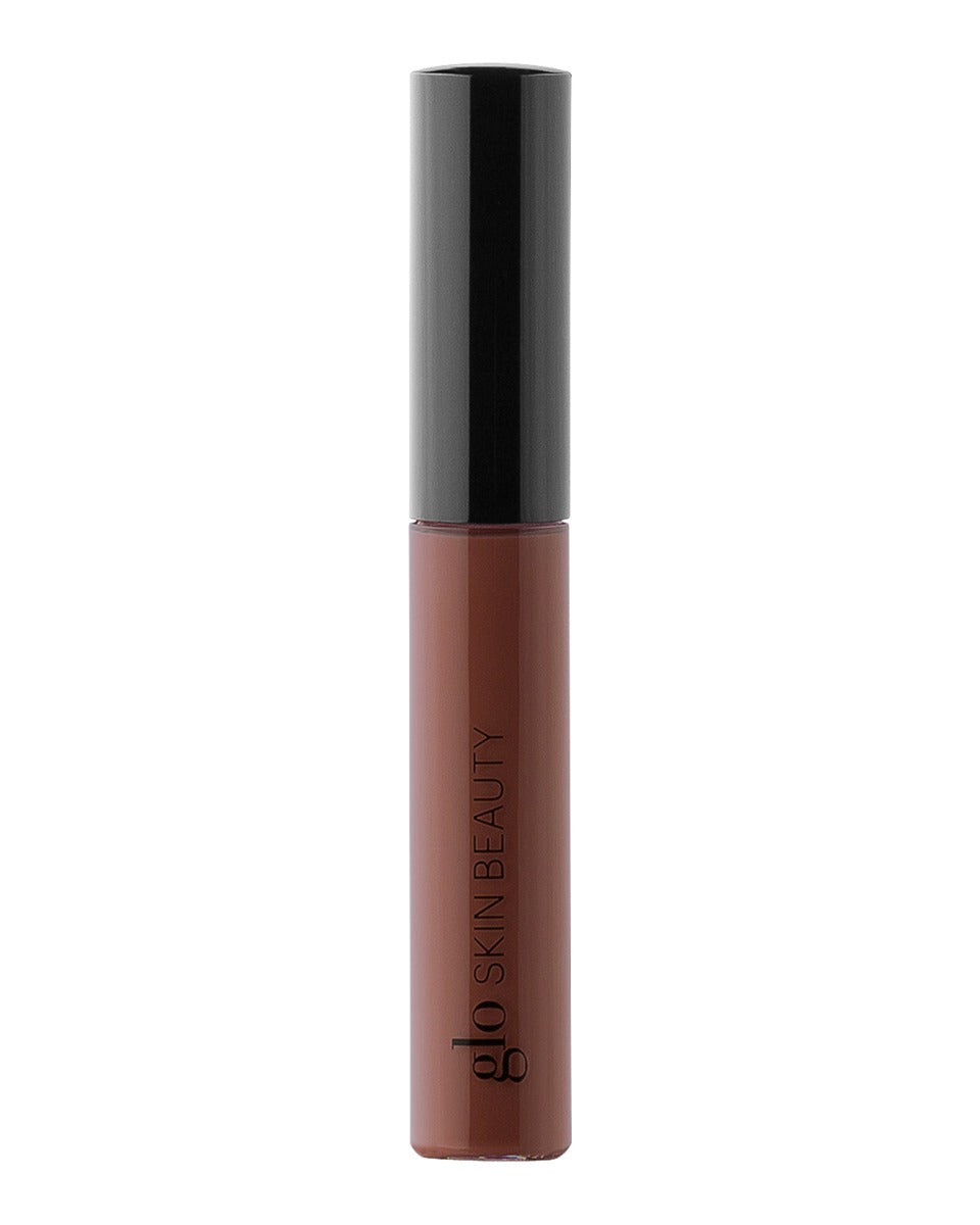 Front view of Conditioning Lip Gloss in Speakeasy showcasing brown gloss tube with black cap and Glo Skin Beauty logo on white background