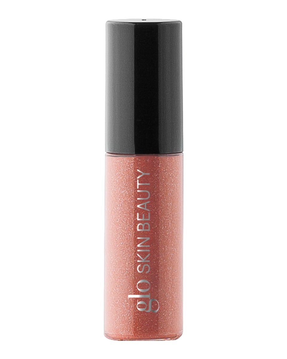 peachy shimmery lip gloss tube labeled glo SKIN BEAUTY