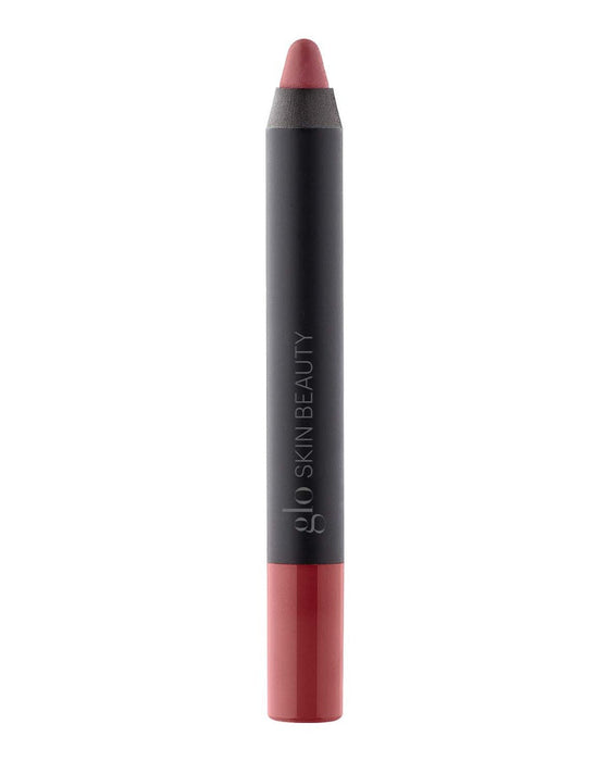 glo SKIN BEAUTY cream-glaze lip crayon, muted rosy red twist-up pencil