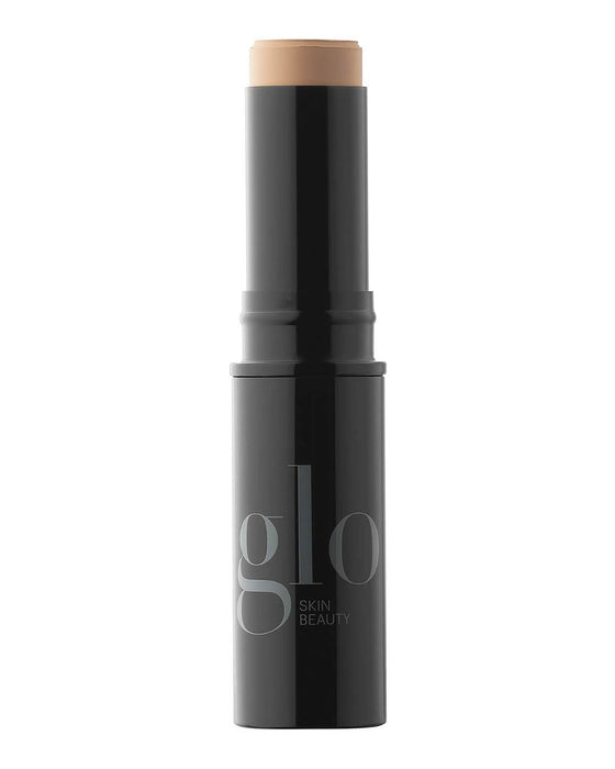 glo SKIN BEAUTY HD mineral foundation stick, black tube with beige foundation exposed