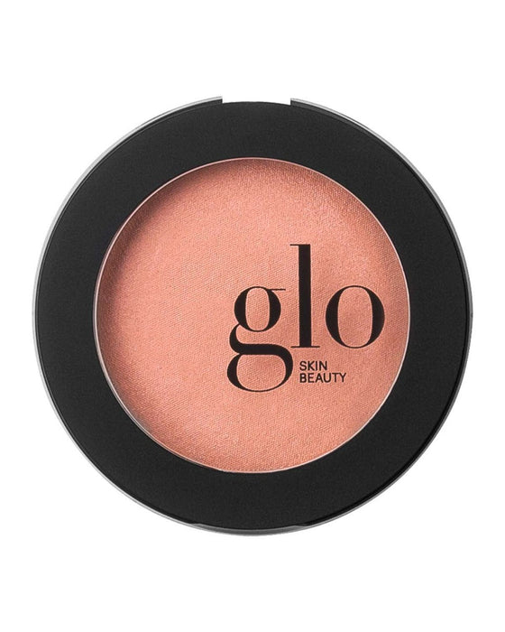 peach powder blush in black round compact labeled glo SKIN BEAUTY