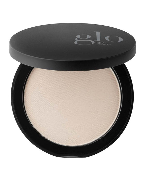 Pressed finishing powder compact with glo SKIN BEAUTY logo on black lid