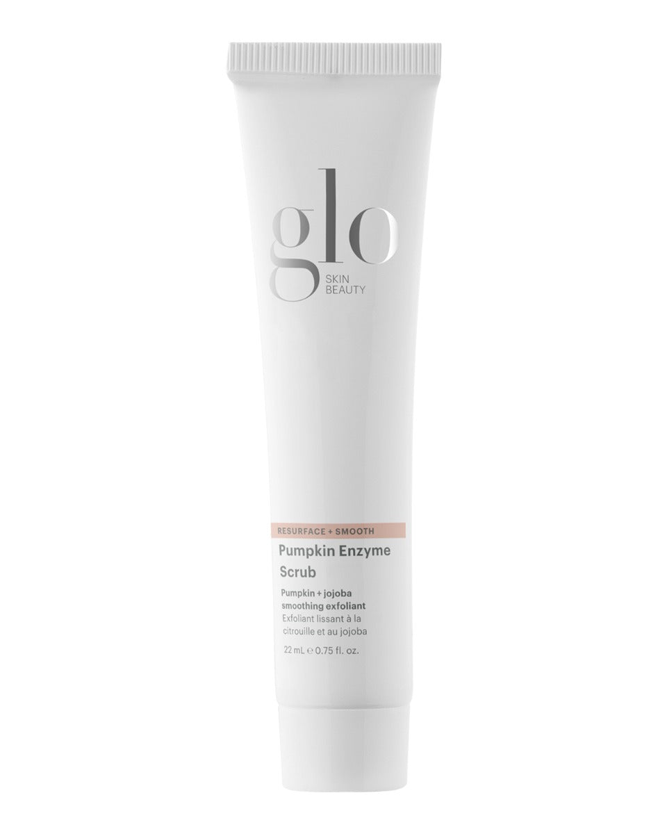 Front view of travel-size Glo Skin Beauty Pumpkin Enzyme Scrub tube showcasing label text and 22 mL size on white background