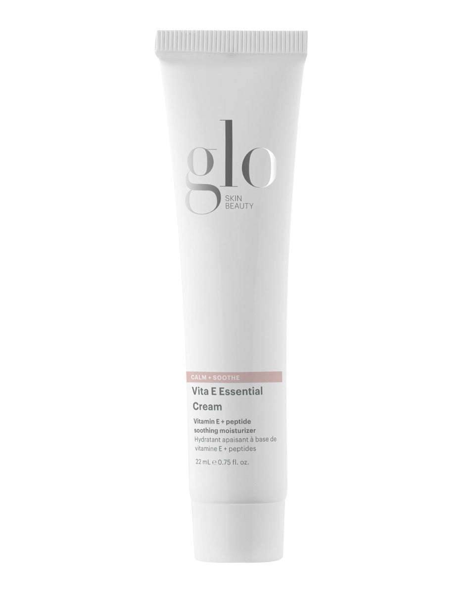 Front view of Vita E Essential Cream travel-size tube showcasing product label and 22 mL size on white background